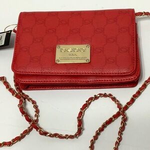Ladies cross gold strap small purse. Color Red